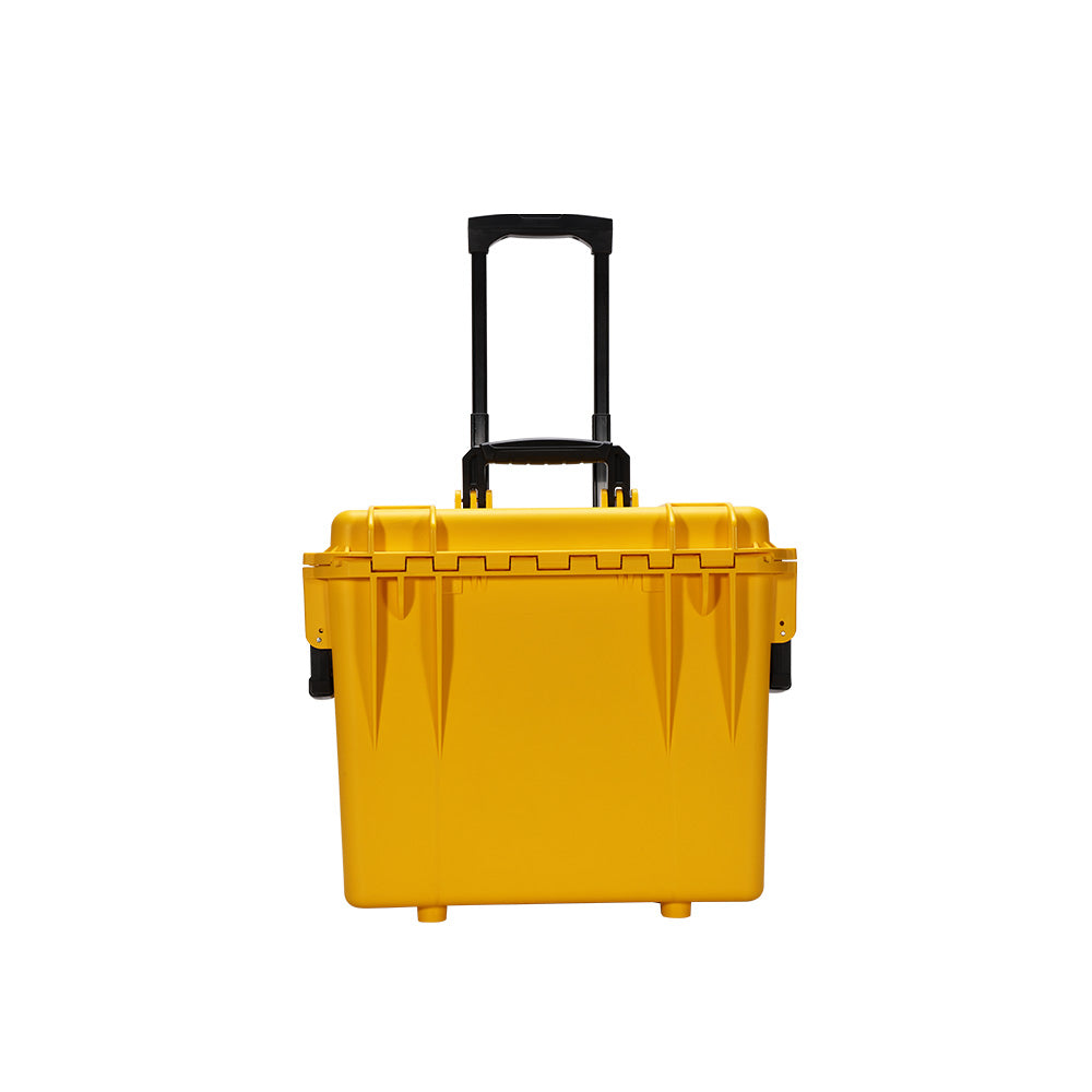 HKS-29D portable PEMF therapy machine closed in its yellow wheeled hard case, front view