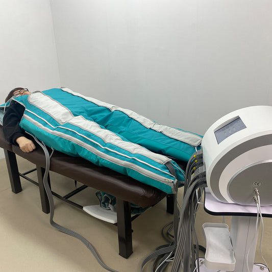 Person using pressotherapy bib overalls for leg recovery therapy